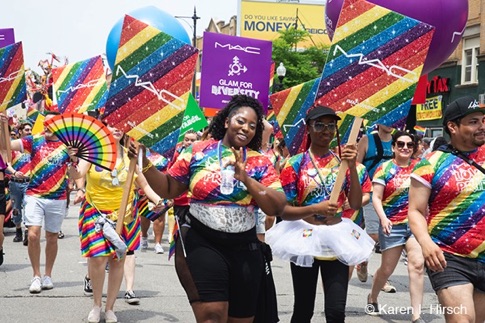Colorful females marching in parade